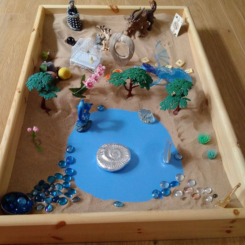 caja-arena